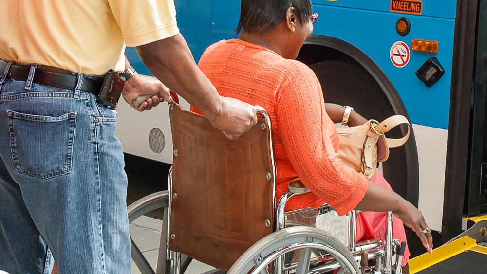 disability_attendant Kings Transit rider with disabilities and attendant